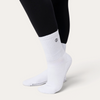 Calzini antiscivolo bianchi Bombafit con suola grip in silicone e polsino a coste per yoga e pilates