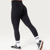 Leggings neri Bombafit a vita alta con effetto push-up e tasche laterali, indossati per allenamento fitness.