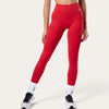 Leggings Bombafit Nyx push up seamless di colore rosso sangue indossati da una modella con top coordinato