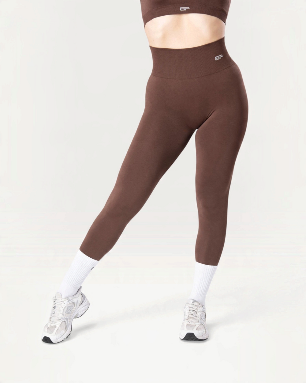 Leggings Bombafit Everyday Seamless marroni a vita alta con tessuto tecnico traspirante e logo discreto