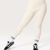 Leggings Bombafit Sense beige a vita alta con incrocio frontale, tasche laterali ed effetto push-up per fitness