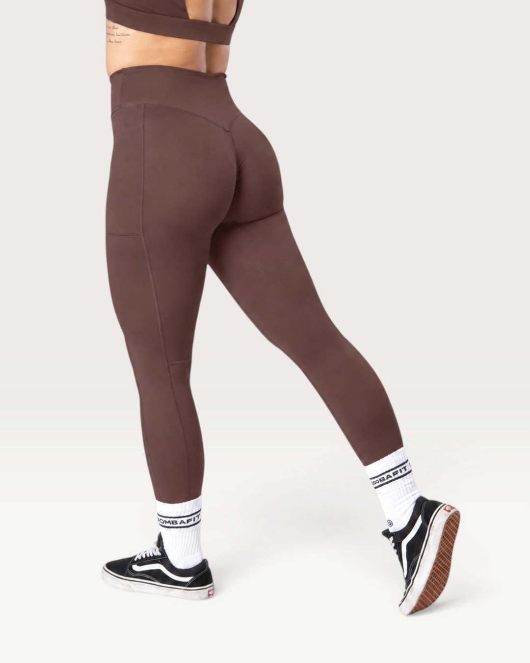 Leggings Bombafit Sense marroni a vita alta con effetto push-up, tasche laterali e tessuto elasticizzato