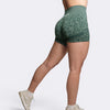 Bombafit Oasis Shorts Leopard in dark green with leopard print, high-waisted, seamless design, and shaping effect.