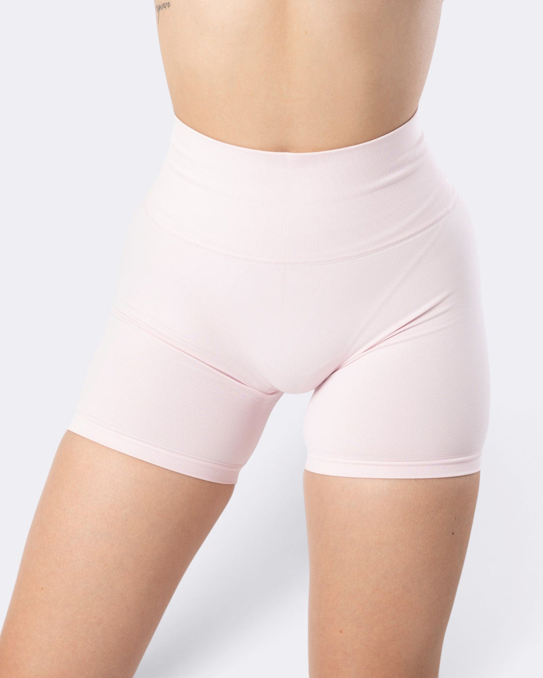 Shorts leggings Bombafit Atena Seamless a vita alta in tessuto tecnico traspirante color rosa fairy per fitness