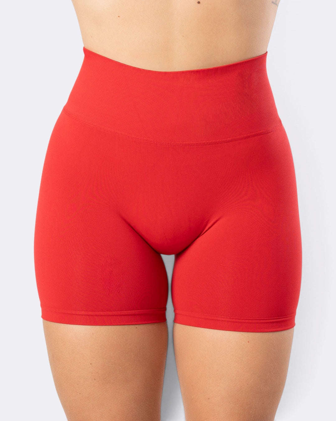 Shorts leggings Bombafit Atena Seamless rosso aurora a vita alta in tessuto tecnico traspirante senza cuciture