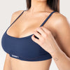 Top sportivo Bombafit Unity blu notte senza cuciture con spalline sottili e banda elastica di supporto